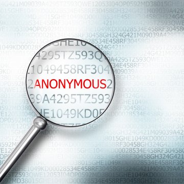 free paid vpn service magnifying glass over red anonymous word